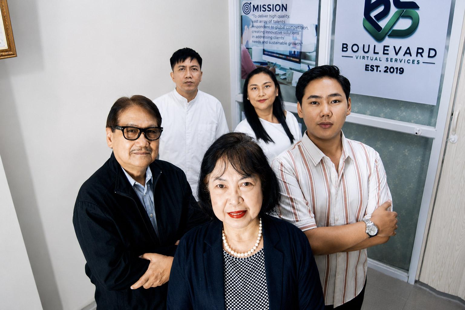 The Boulevard Virtual Services leadership team at their Naga City office